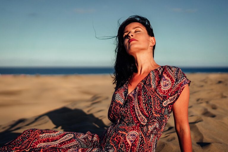 A person standing calmly in natural morning light without distractions