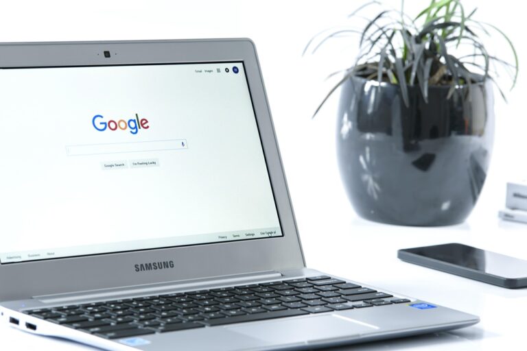 A person reviewing clear website content on a clean desk workspace
